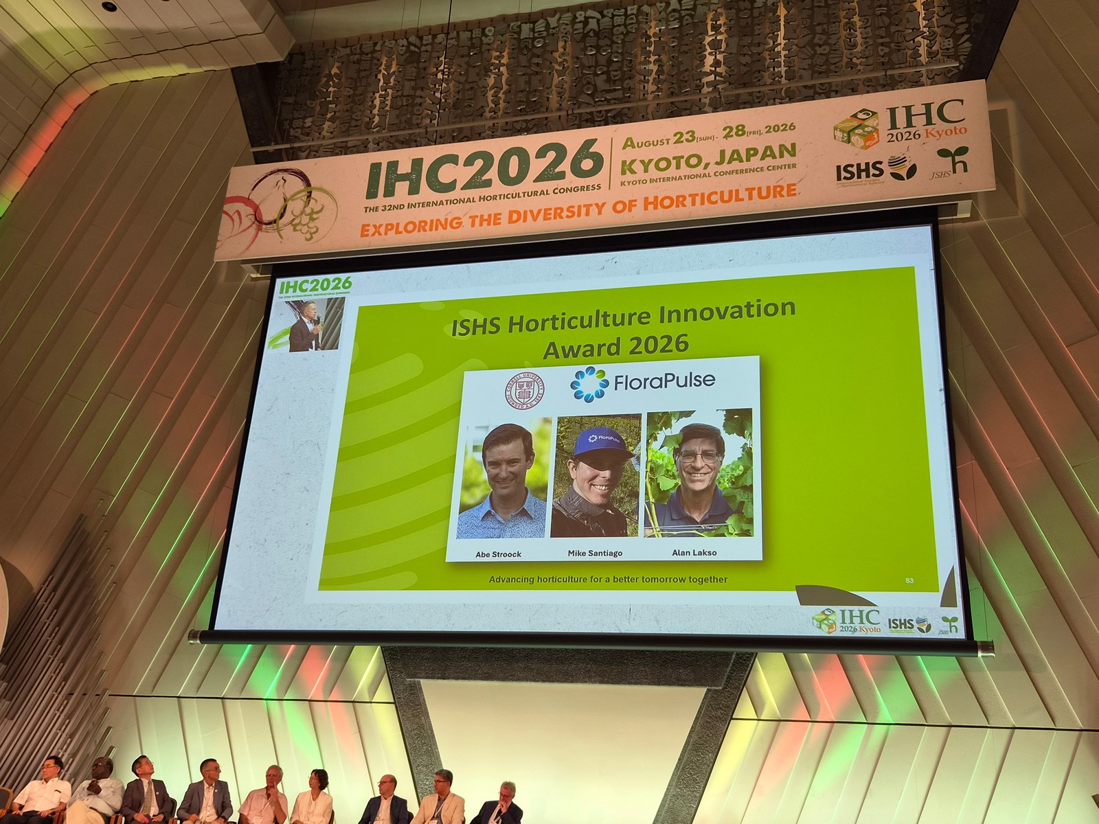 The ISHS Horticulture Innovation Award 2026 slide on screen at IHC2026 in Kyoto, naming Abe Stroock, Mike Santiago and Alan Lakso under the Cornell and FloraPulse logos